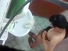 Asian Stepmom spied while showering