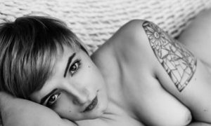 NelParker naked before webcam in live video chat