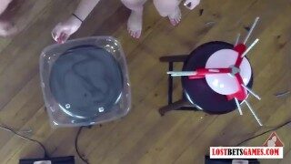 4 girls play a game of strip pop the balloon