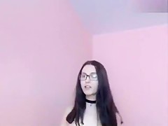 Brunette Morv playing with a vibrator and reading a book