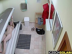 Busty Milf Rubbing Her Pussy In Solarium